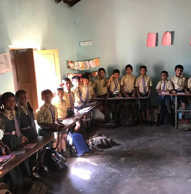 Students in rural classroom benefiting from Waterwoods education support program in Kabini region