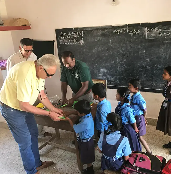 Volunteers from Waterwoods engaging with school children during educational outreach drive