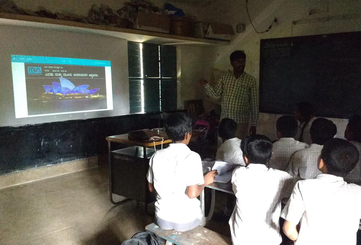 Technology-based learning session for schoolchildren supported by Waterwoods Kabini’s education outreach initiative.