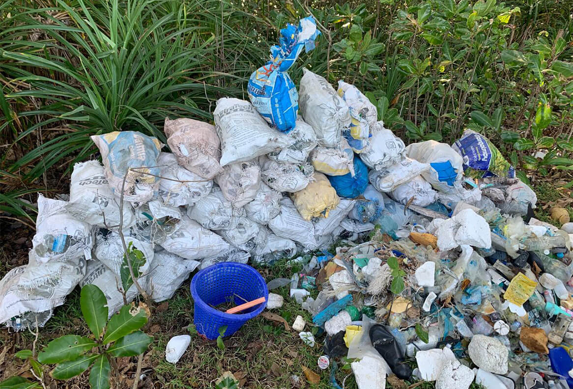 Collected waste from Waterwoods Kabini cleanup drive promoting ecosystem protection and zero-waste initiatives.