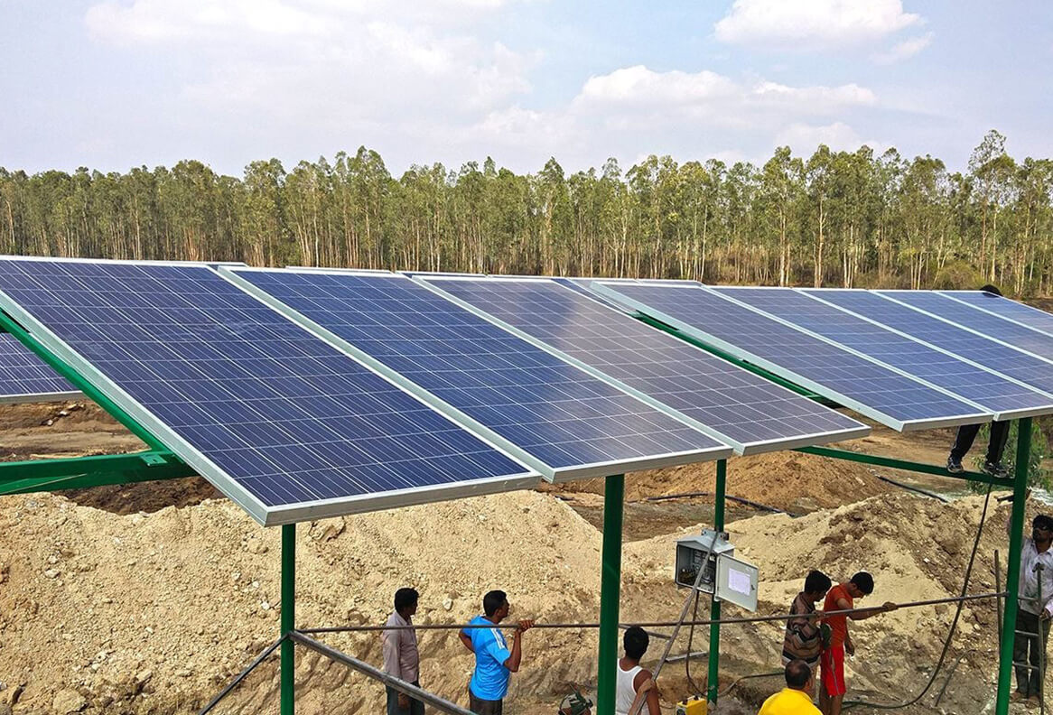 Solar-powered water pump installation in Kabini forest in partnership with WWF for sustainable energy and wildlife care.