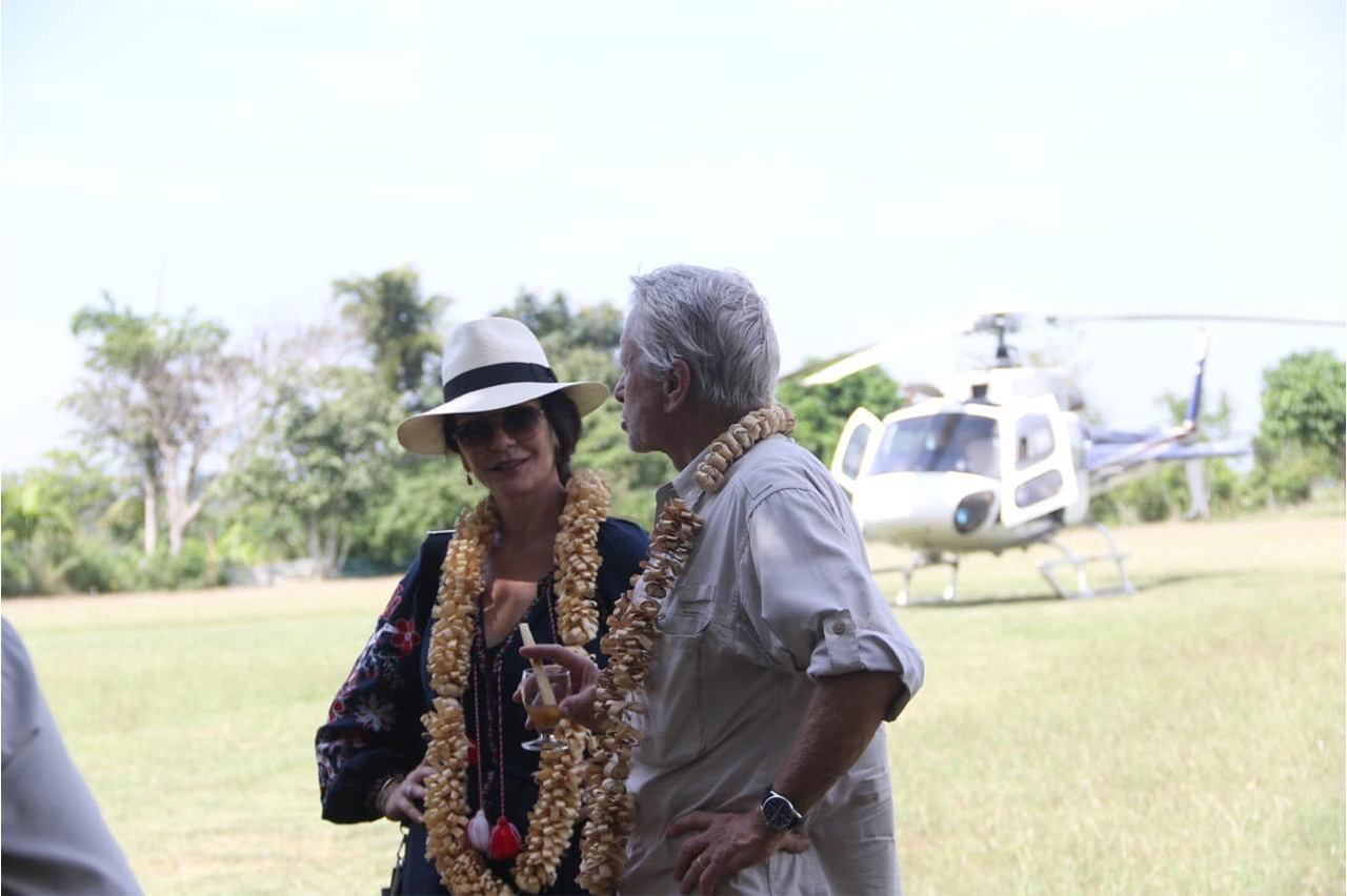 Guests arriving at Waterwoods Kabini by helicopter for VIP travel experience from Bangalore